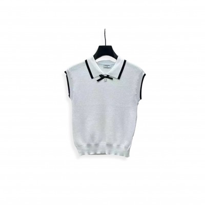 CHANEL COLLARED VEST WITH CONTRASTING TRIM BOW AT THE CHEST CHANEL COLLARED VEST WITH CONTRASTING TRIM BOW AT THE CHEST